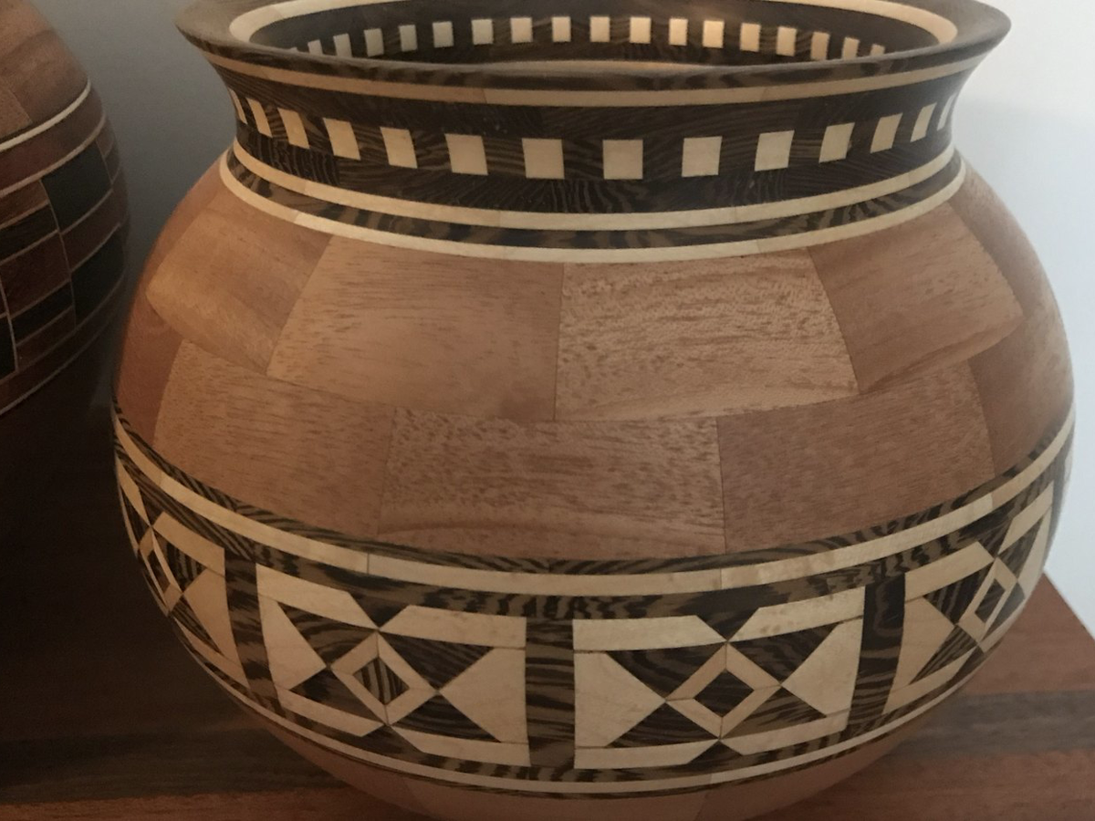 A finished segmented bowl with patterned feature rings
